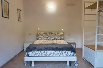 Letto o letti in una camera di Appartamento Il Fattore