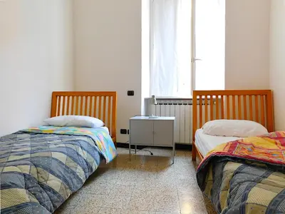 Letto o letti in una camera di Welcome to alma's house, Levanto