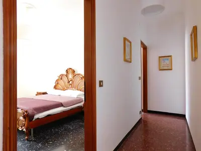 Letto o letti in una camera di Le stanze del papa, Levanto
