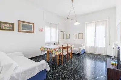 Letto o letti in una camera di Spazioso appartamento Vista Mare, Levanto