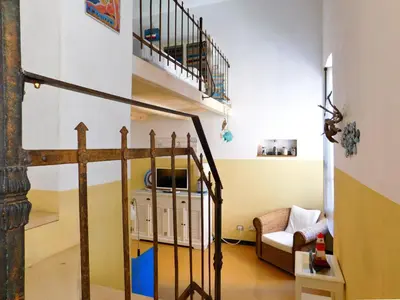 Letto o letti in una camera di La casa del vecchio pescatore, Levanto