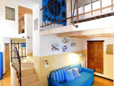 Letto o letti in una camera di La casa del vecchio pescatore, Levanto