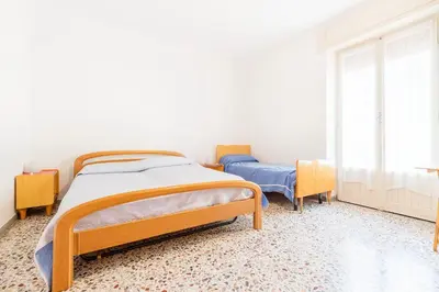 Letto o letti in una camera di A casa di Mauro, Levanto