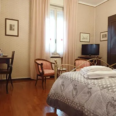 Letto o letti in una camera di La Casa di Tino
