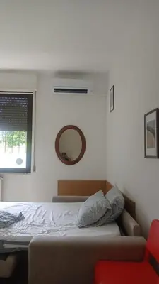 Letto o letti in una camera di Senza Pensieri via Viviani