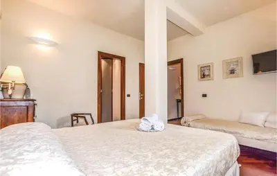 Letto o letti in una camera di La Perla