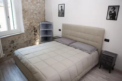 Letto o letti in una camera di MentoreR&B