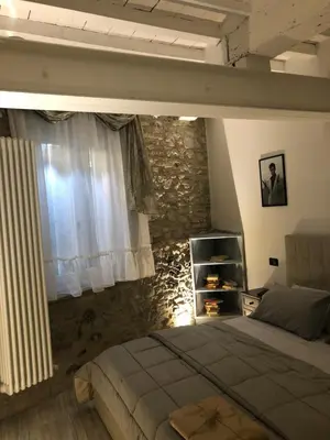 Letto o letti in una camera di MentoreR&B