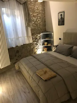 Letto o letti in una camera di MentoreR&B