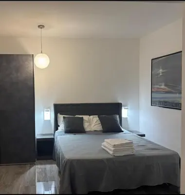 Letto o letti in una camera di Villa Cristalli clinica pc