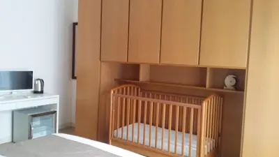 Letto o letti in una camera di Villa Cristalli clinica pc