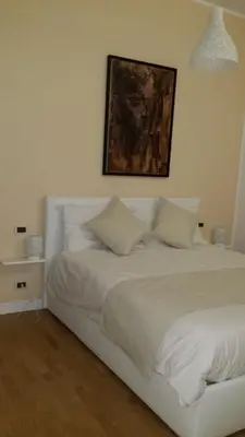 Letto o letti in una camera di Villa Cristalli clinica pc