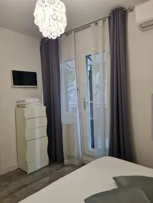 Letto o letti in una camera di Villa Cristalli clinica pc