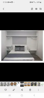 Letto o letti in una camera di Villa Cristalli clinica pc