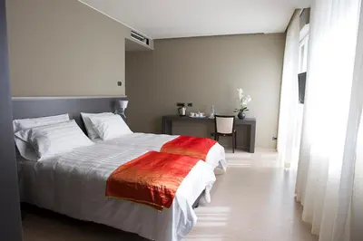 Letto o letti in una camera di Zara Rooms & Suites