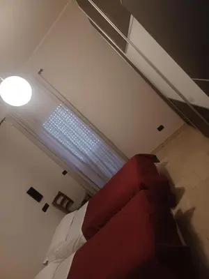 Letto o letti in una camera di Residence Taverna