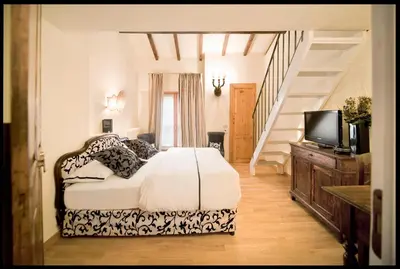 Letto o letti in una camera di Cantarelli Bed and breakfast