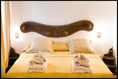 Letto o letti in una camera di Cantarelli Bed and breakfast