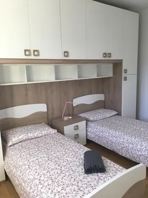 Letto o letti in una camera di VILLA DEGLI ULIVI