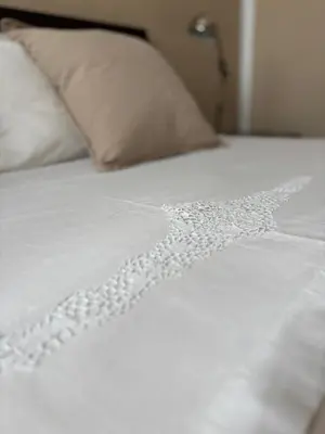 Letto o letti in una camera di Casa Roberta - Esperienze di campagna