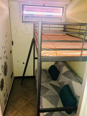 Letto o letti a castello in una camera di Casa di Giulia, a due passi dal mare di Cavi di Lavagna