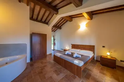 Letto o letti in una camera di Agriturismo Borgo Biaia
