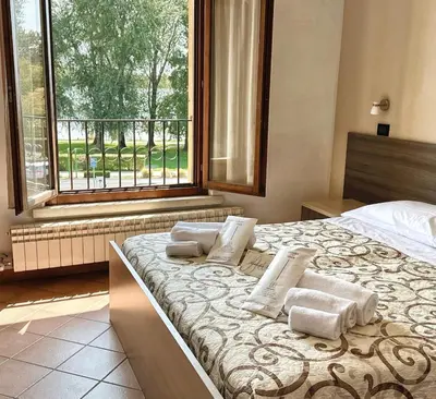 Letto o letti in una camera di Residenza Bibiena