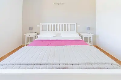 Letto o letti in una camera di CASA VACANZA IL PORTICO