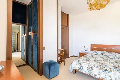 Letto o letti in una camera di Villa Riviera