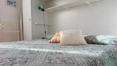 Letto o letti in una camera di Amelie House