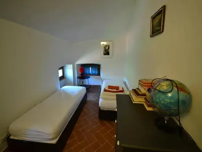 Letto o letti in una camera di Rustic Tuscan Cottage
