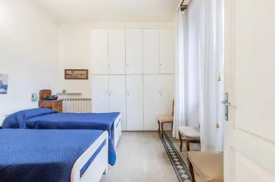Letto o letti in una camera di La mia casa sul mare, Levanto