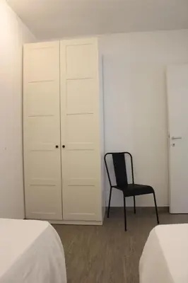 Letto o letti in una camera di CASAMIA con giardino