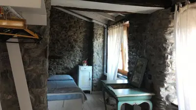 Letto o letti in una camera di Casa La Rosa