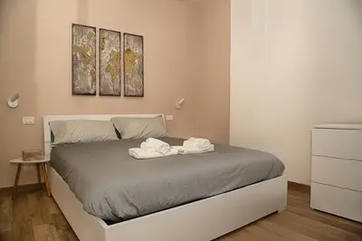 Letto o letti in una camera di CasaLou'