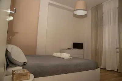 Letto o letti in una camera di CasaLou'