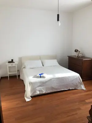 Letto o letti in una camera di VILLA SECCHI