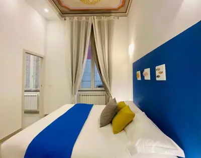 Letto o letti in una camera di Casa Rosa al Mare, Rapallo