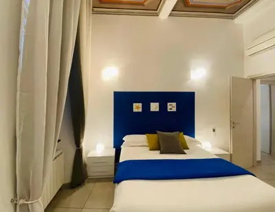 Letto o letti in una camera di Casa Rosa al Mare, Rapallo