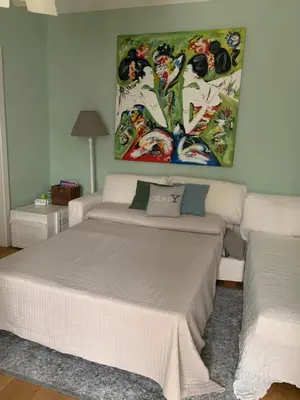 Letto o letti in una camera di Secret Garden and Cozy Flat