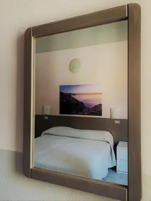 Letto o letti in una camera di Albergo La Villetta