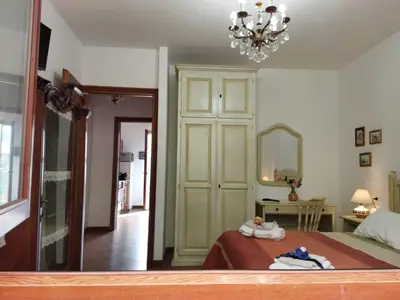 Letto o letti in una camera di Appartamenti da Ermanno