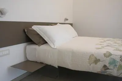 Letto o letti in una camera di ARIA Design B&B Levanto
