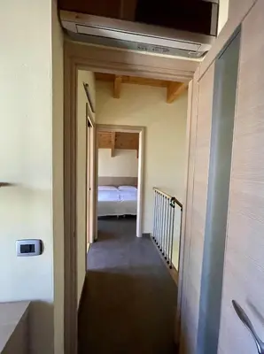 Letto o letti in una camera di Residence Corte della Vittoria