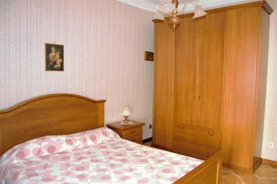 Letto o letti in una camera di Appartamento Francesca