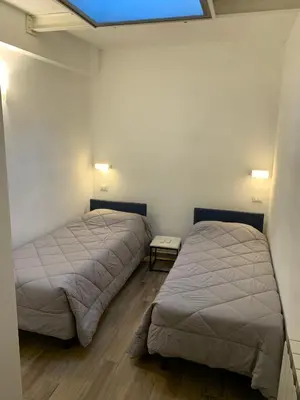 Letto o letti in una camera di Ca du Sergio - Le Mura