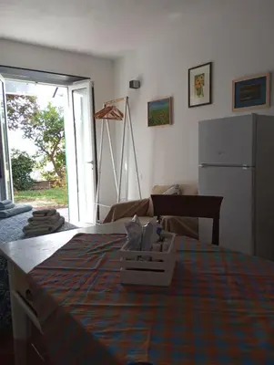 Letto o letti in una camera di Tigullio Vacations panoramica apartments