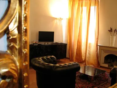 TV o dispositivi per l'intrattenimento presso Parizzi Suites&Studio Restaurant