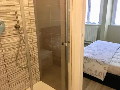 Letto o letti in una camera di MONOLOCALE VICINO MILANO1