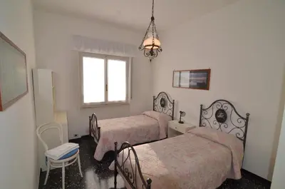 Letto o letti in una camera di Levanto Rentals